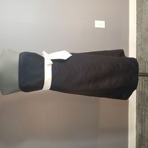 Alfred Sung black satin with white bow strapless gown in size 14.  Fully lined.